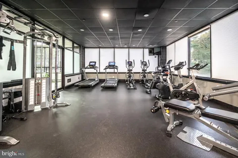 a view of a swimming pool with a balcony
