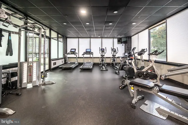 a view of a swimming pool with a balcony