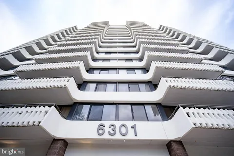 a view of a balcony with a book shelf