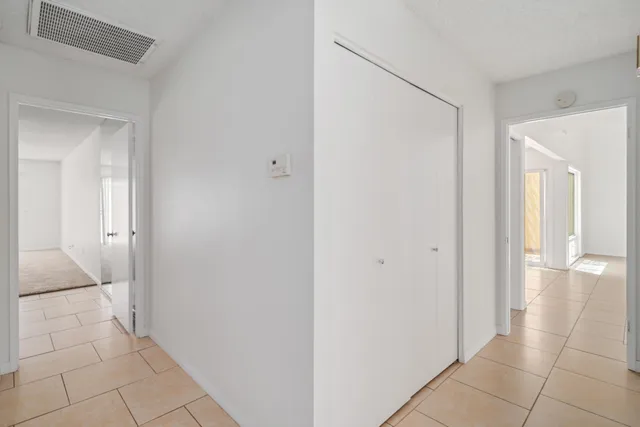 a view of cabinets and window