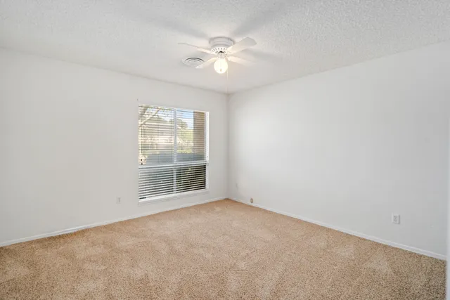 a bathroom with a sink toilet tub and shower