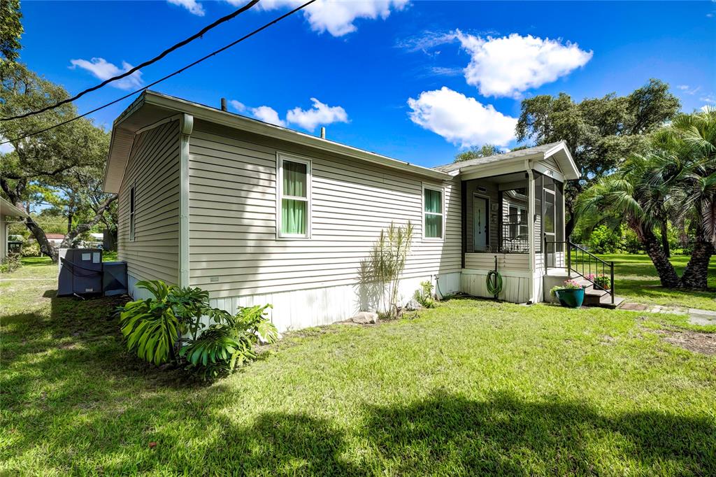 3307 Keye Drive Spring Hill, FL 34606 - Photo 2 of 29 a view of a house with backyard and sitting area