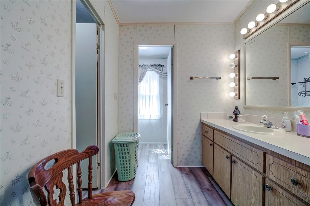 3307 Keye Drive Spring Hill, FL 34606 - Photo 23 of 29 a spacious bathroom with 2 sink and a mirror