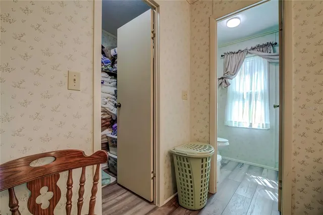 a view of a hallway with front door