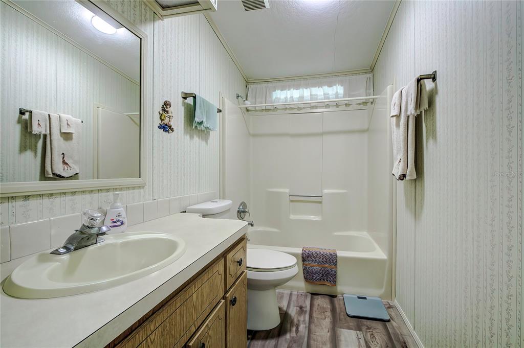 3307 Keye Drive Spring Hill, FL 34606 - Photo 29 of 29 a bathroom with a sink toilet and shower