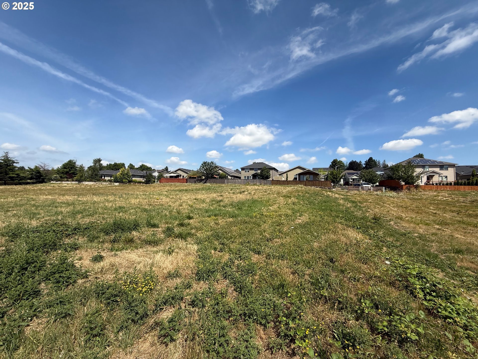 Southwest Hartley Avenue Gresham, OR 97080 - Photo 10 of 12 a view of a lake with houses in the back