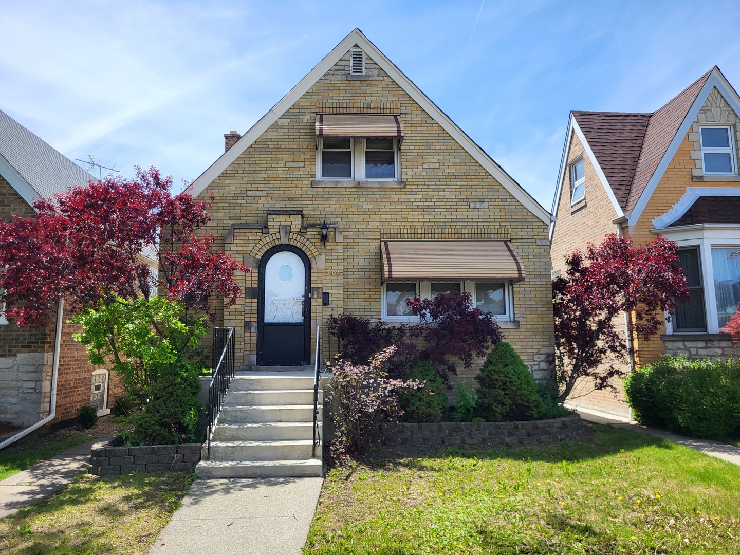 3034 North Nagle Avenue Chicago, IL 60634 - Photo 1 of 1 a front view of a house with garden