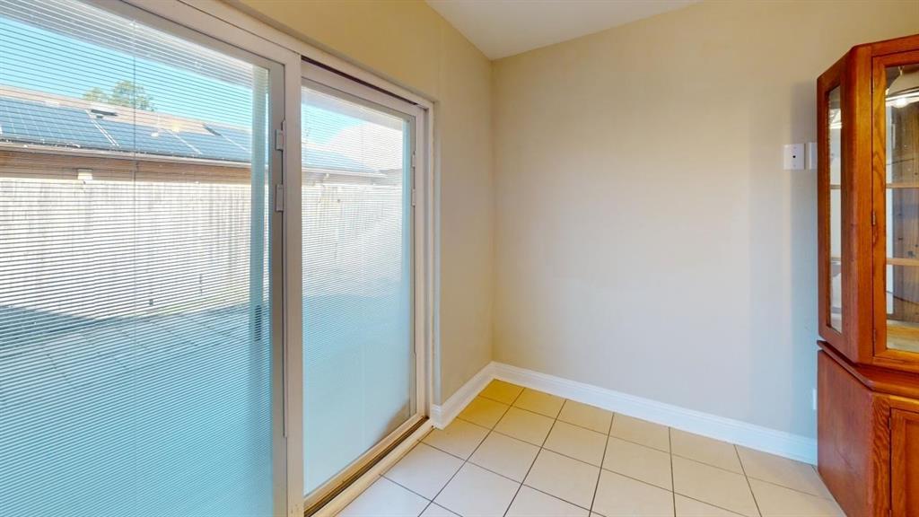 3005 Meandering Way Bedford, TX 76021 - Photo 7 of 22 a view of an empty room and window