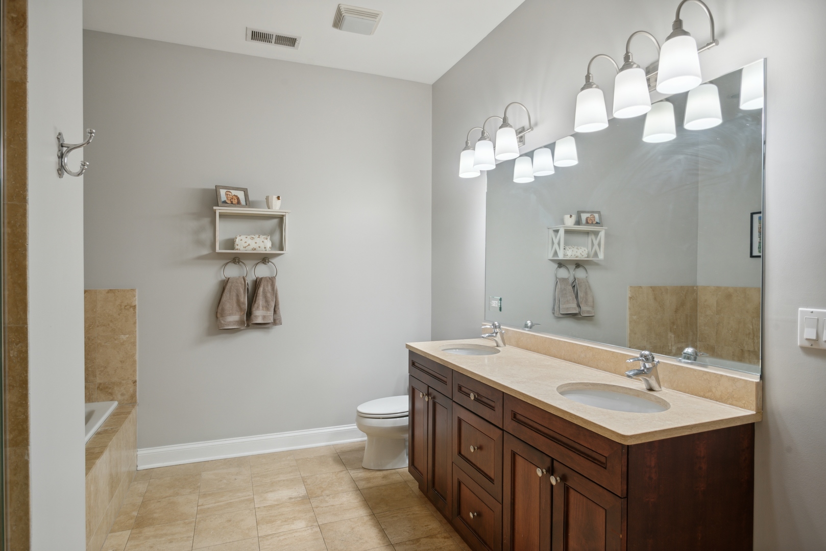 955 West Monroe Street, Unit 3C Chicago, IL 60607 - Photo 13 of 22 a bathroom with a sink and a mirror
