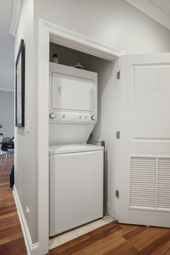 955 West Monroe Street, Unit 3C Chicago, IL 60607 - Photo 17 of 22 a view of storage and utility room with wooden floor