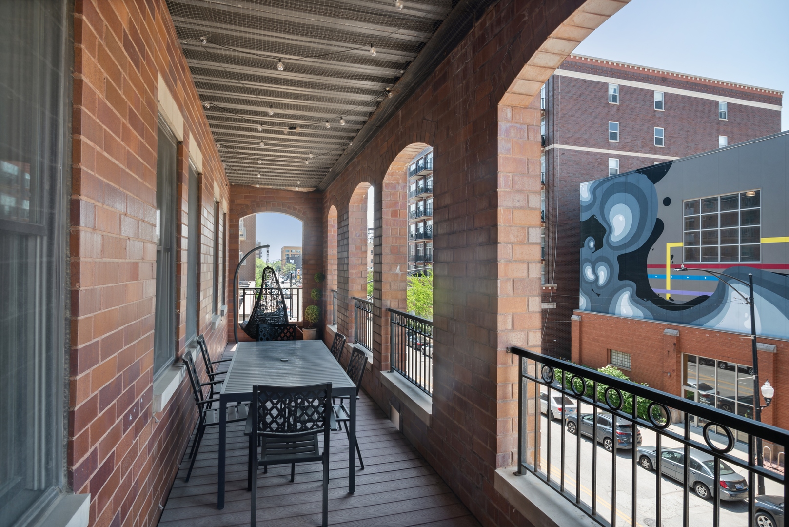 955 West Monroe Street, Unit 3C Chicago, IL 60607 - Photo 19 of 22 a view of a balcony with chairs