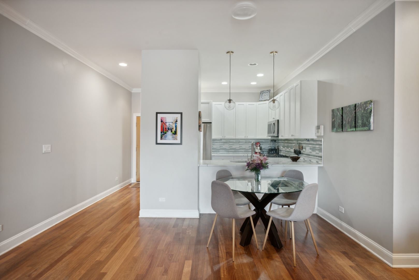 955 West Monroe Street, Unit 3C Chicago, IL 60607 - Photo 9 of 22 a view of a dining room with furniture and wooden floor