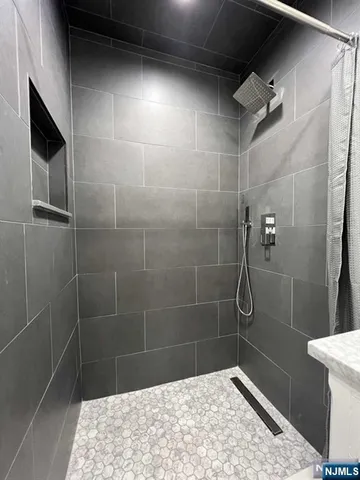 a view of a livingroom with a flat screen tv