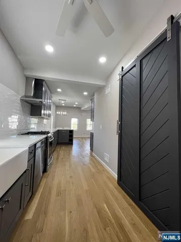 an empty room with a empty space and windows