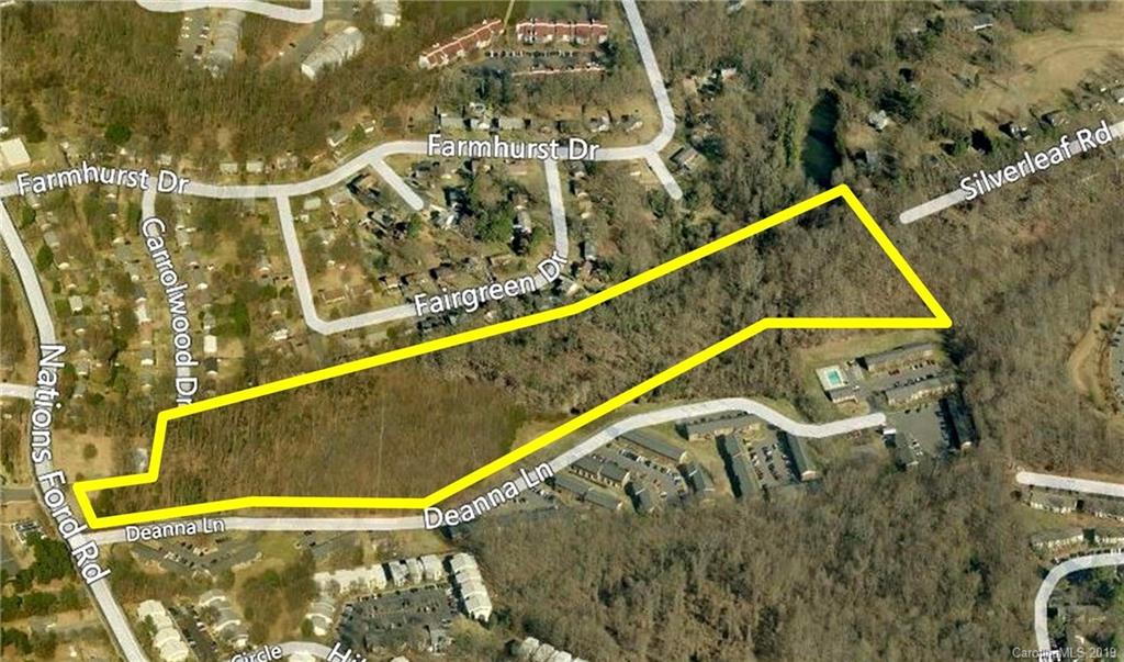 a view of swimming pool with seating area