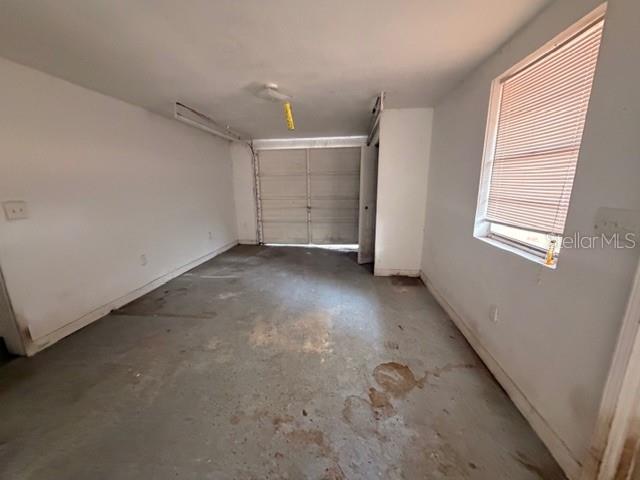 9764 Southwest 153rd Lane Dunnellon, FL 34432 - Photo 12 of 19 an empty room with windows