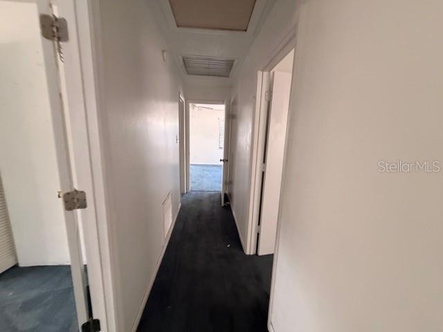 9764 Southwest 153rd Lane Dunnellon, FL 34432 - Photo 13 of 19 a view of a hallway with a wooden floor
