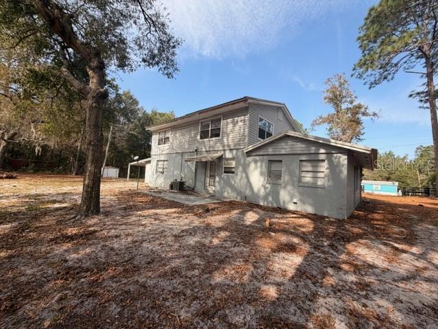 9764 Southwest 153rd Lane Dunnellon, FL 34432 - Photo 2 of 19 a view of a house with a yard
