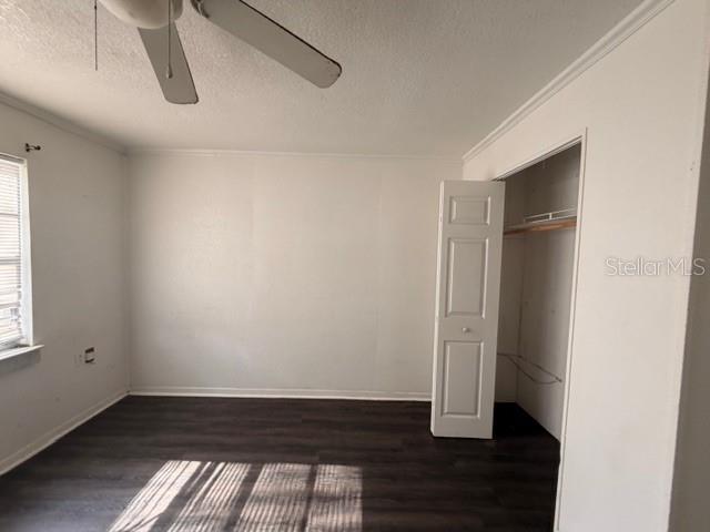 9764 Southwest 153rd Lane Dunnellon, FL 34432 - Photo 8 of 19 an empty room with wooden floor and windows