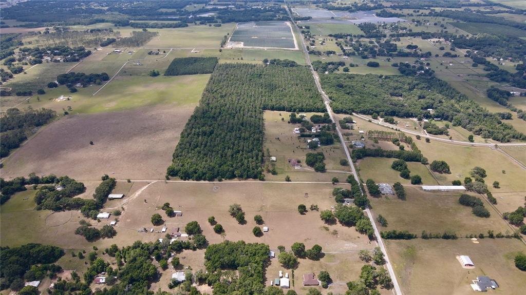 Parrish Grove Road Dade City, FL 33523 - Photo 20 of 23 an aerial view of a house with a yard