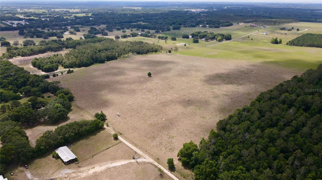 Parrish Grove Road Dade City, FL 33523 - Photo 21 of 23 an aerial view of a houses with a yard