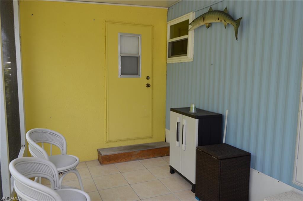 414 Papaya Street, Unit C Goodland, FL 34140 - Photo 12 of 13 a bathroom with a toilet and sink