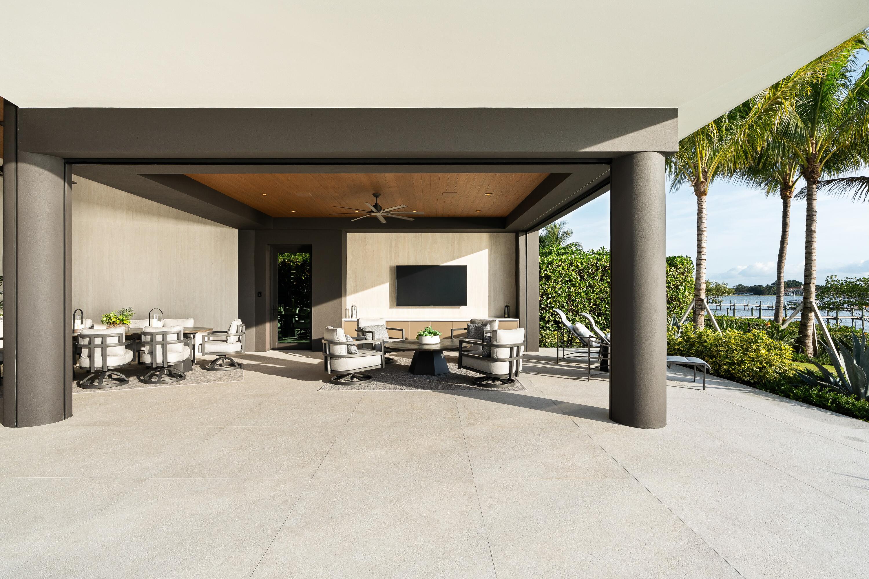 5211 Pennock Point Road Jupiter, FL 33458 - Photo 59 of 69 a view of a room with porch and furniture