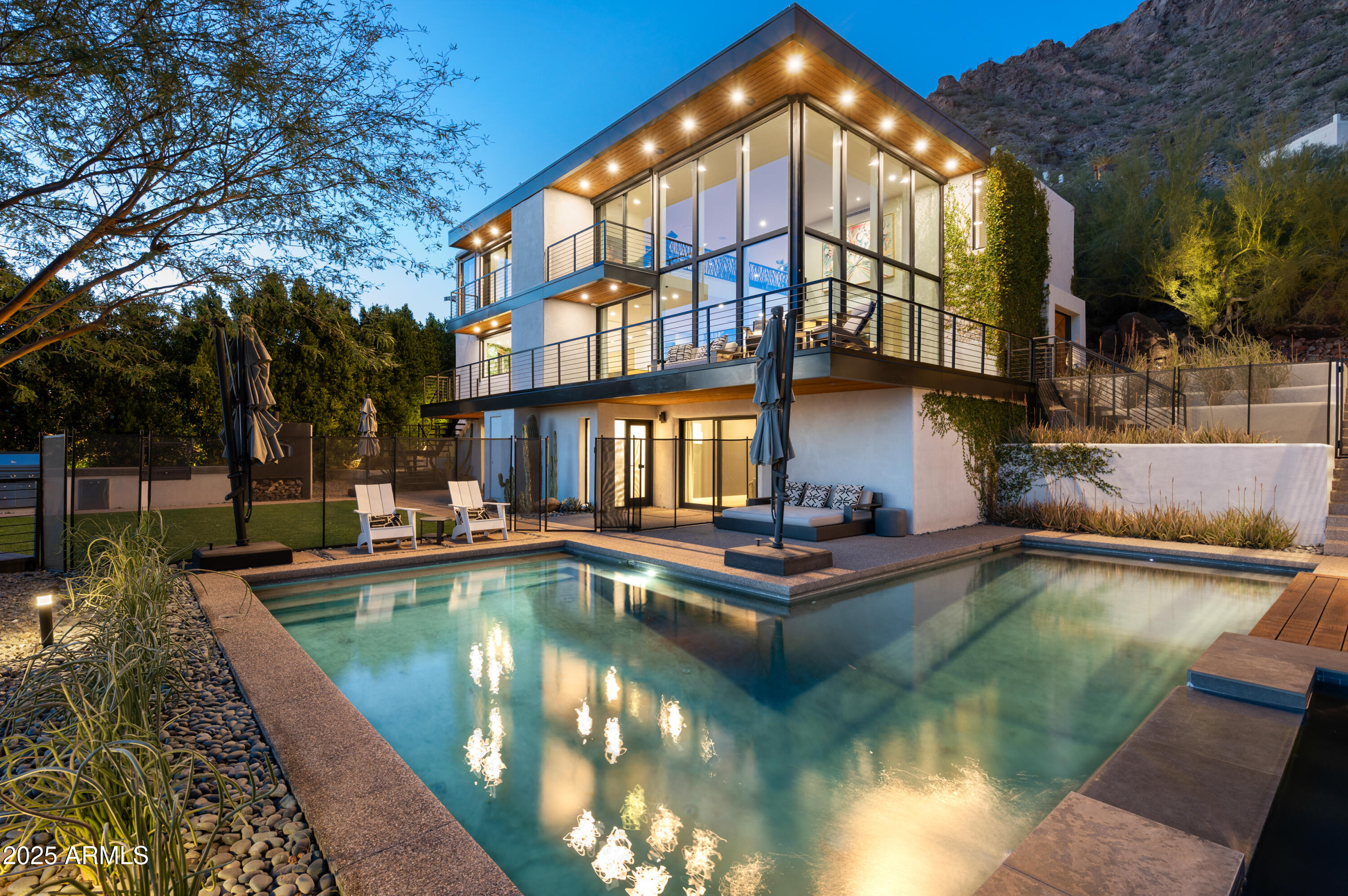 5419 East Valle Vista Road Phoenix, AZ 85018 - Photo 3 of 71 a view of a swimming pool with a patio