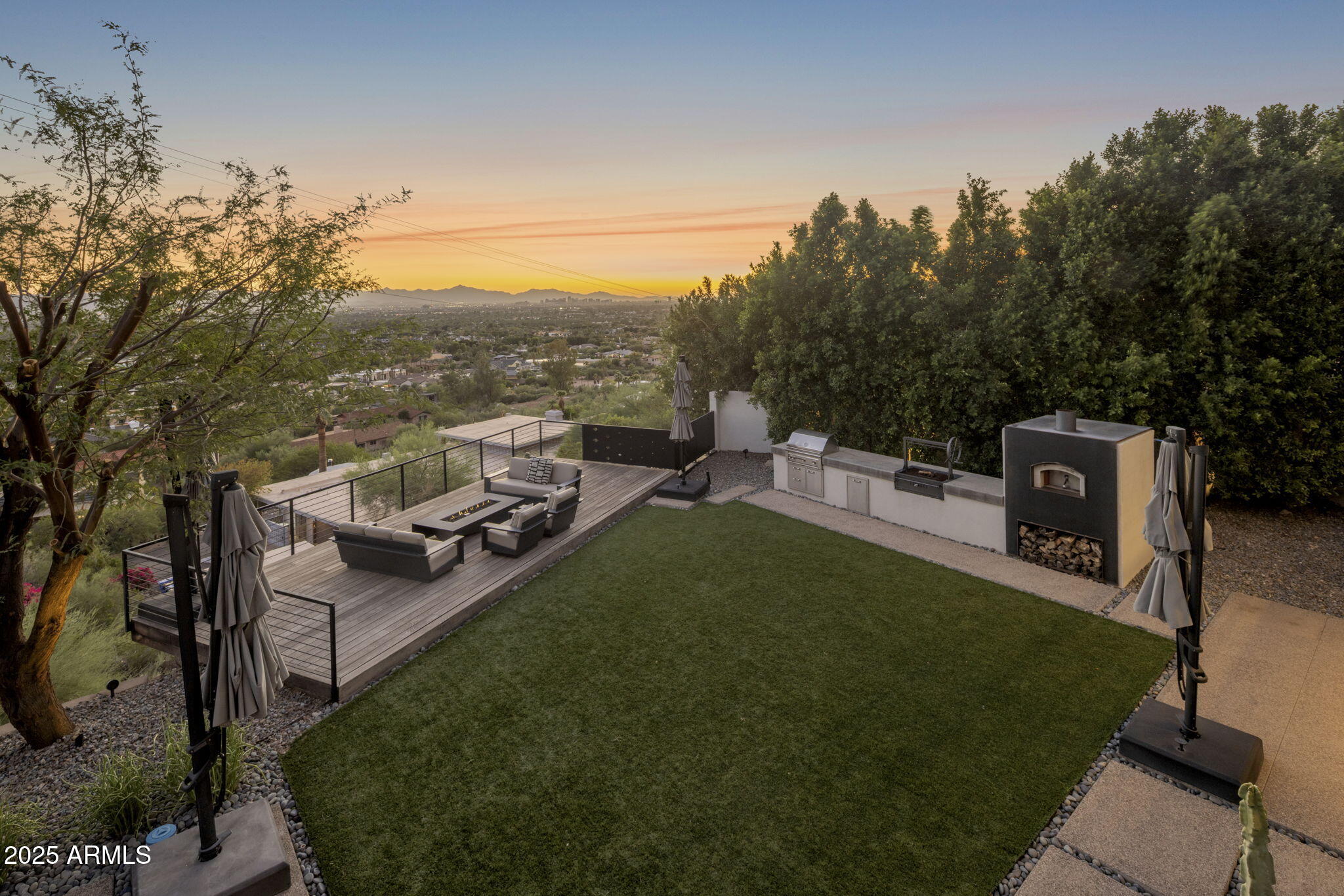5419 East Valle Vista Road Phoenix, AZ 85018 - Photo 63 of 71 a view of a garden with lawn chairs