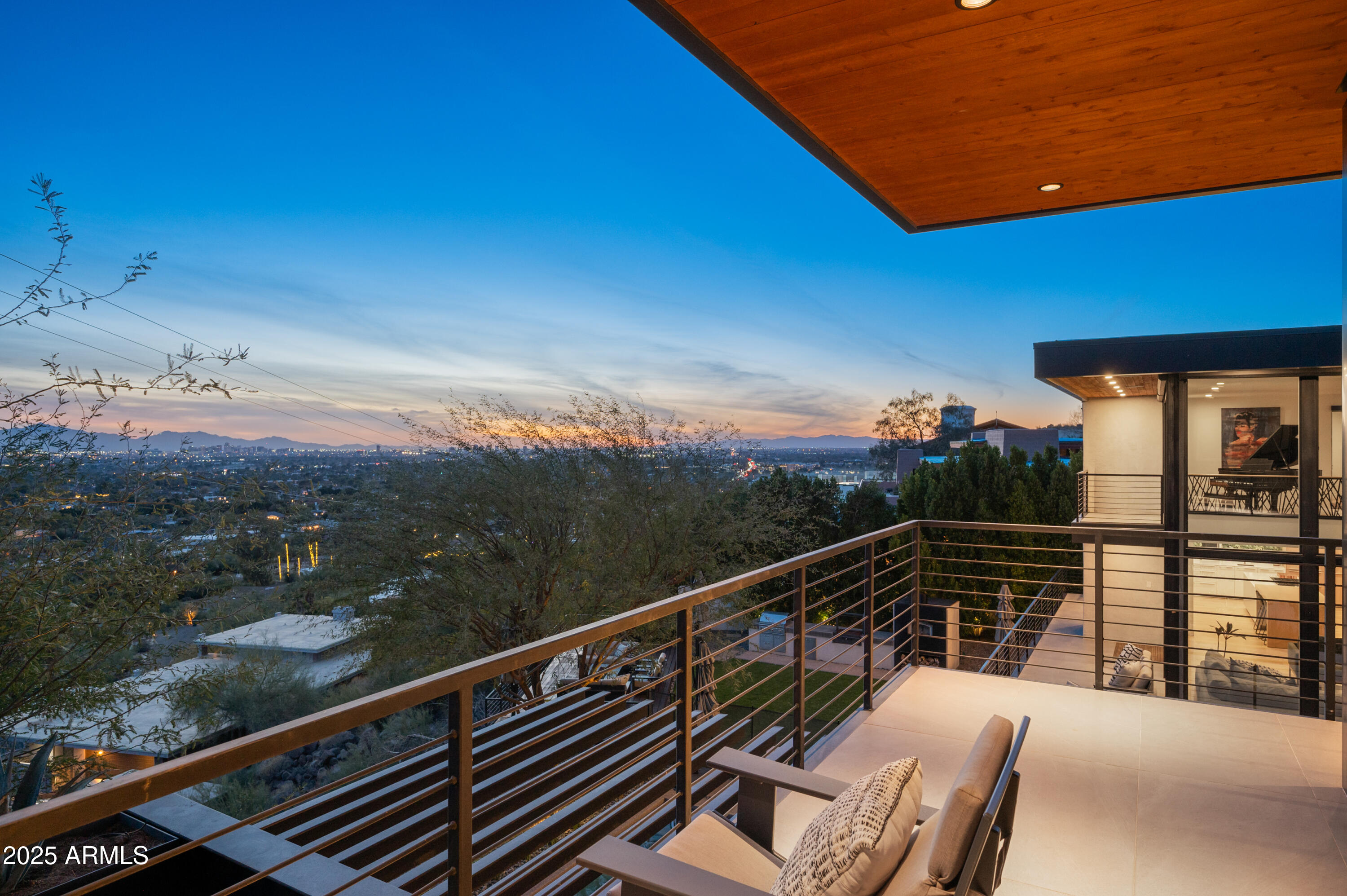 5419 East Valle Vista Road Phoenix, AZ 85018 - Photo 67 of 71 a view of a balcony with wooden floor and outdoor seating