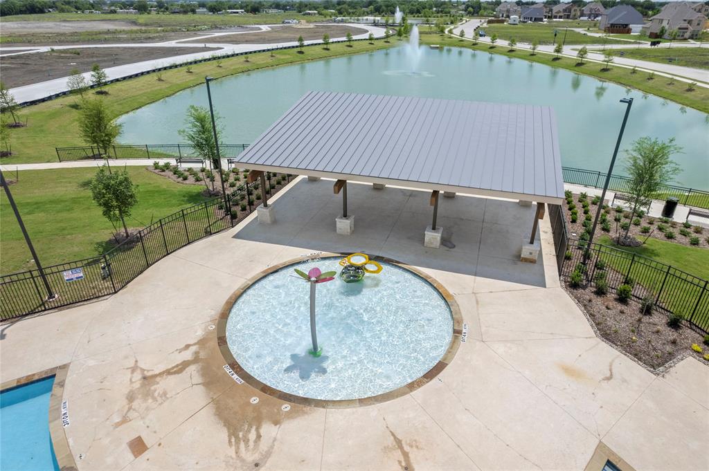 248 Golden Run Drive Fate, TX 75189 - Photo 27 of 34 swimming pool view with a outdoor seating space