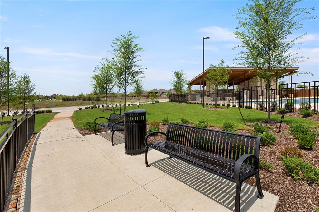248 Golden Run Drive Fate, TX 75189 - Photo 30 of 34 a view of a roof deck with chair and wooden floor