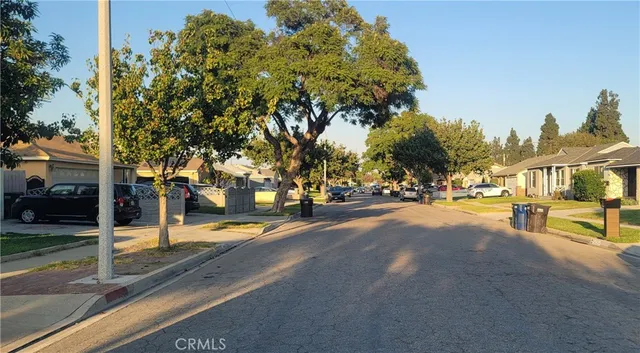 a view of a street with houses