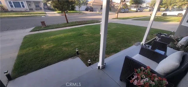 a view of a garden from a balcony