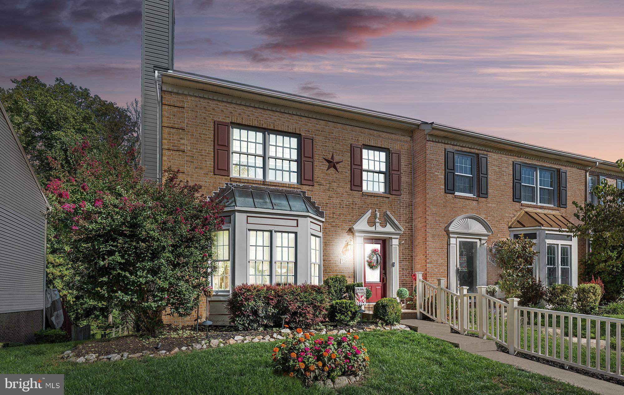 a front view of a house with a porch