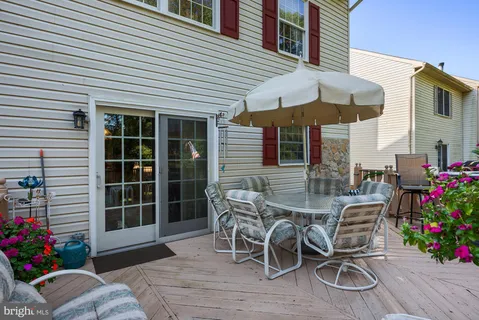 a view of a two chairs in porch