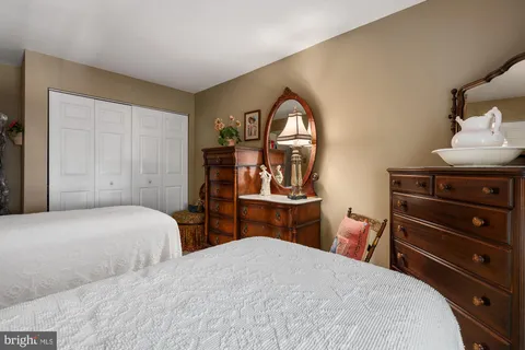 a view of a workspace with furniture and a gym
