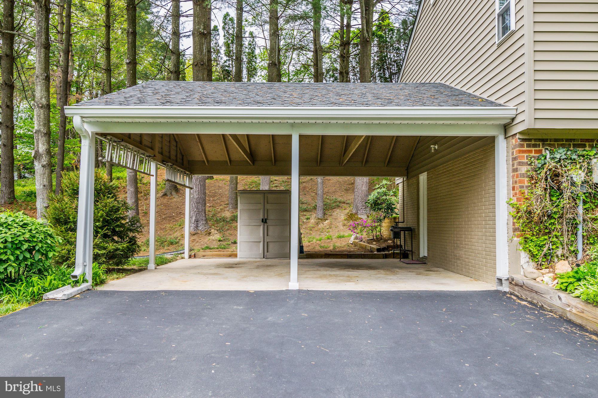 14404 Morton Hall Road Silver Spring, MD 20906 - Photo 3 of 41 Large carport with storage shed