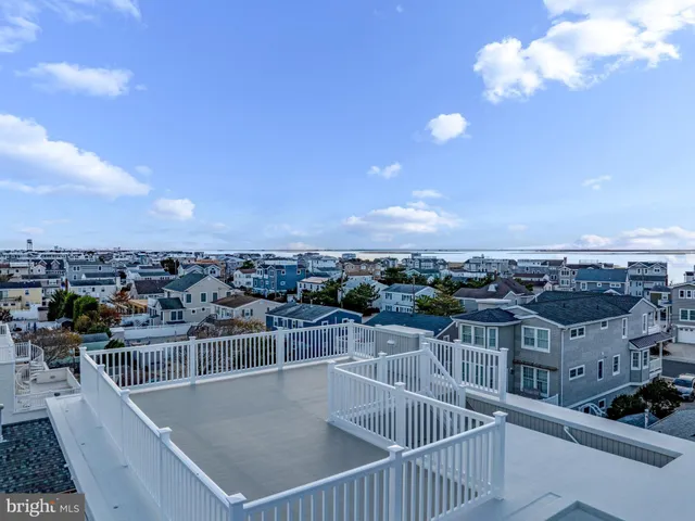 a view of a balcony with city view