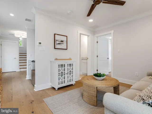 a bedroom with two beds and a window