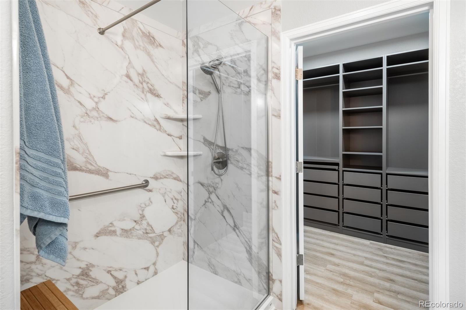 8555 Gold Peak Drive, Unit B Highlands Ranch, CO 80130 - Photo 16 of 38 a bathroom with a shower