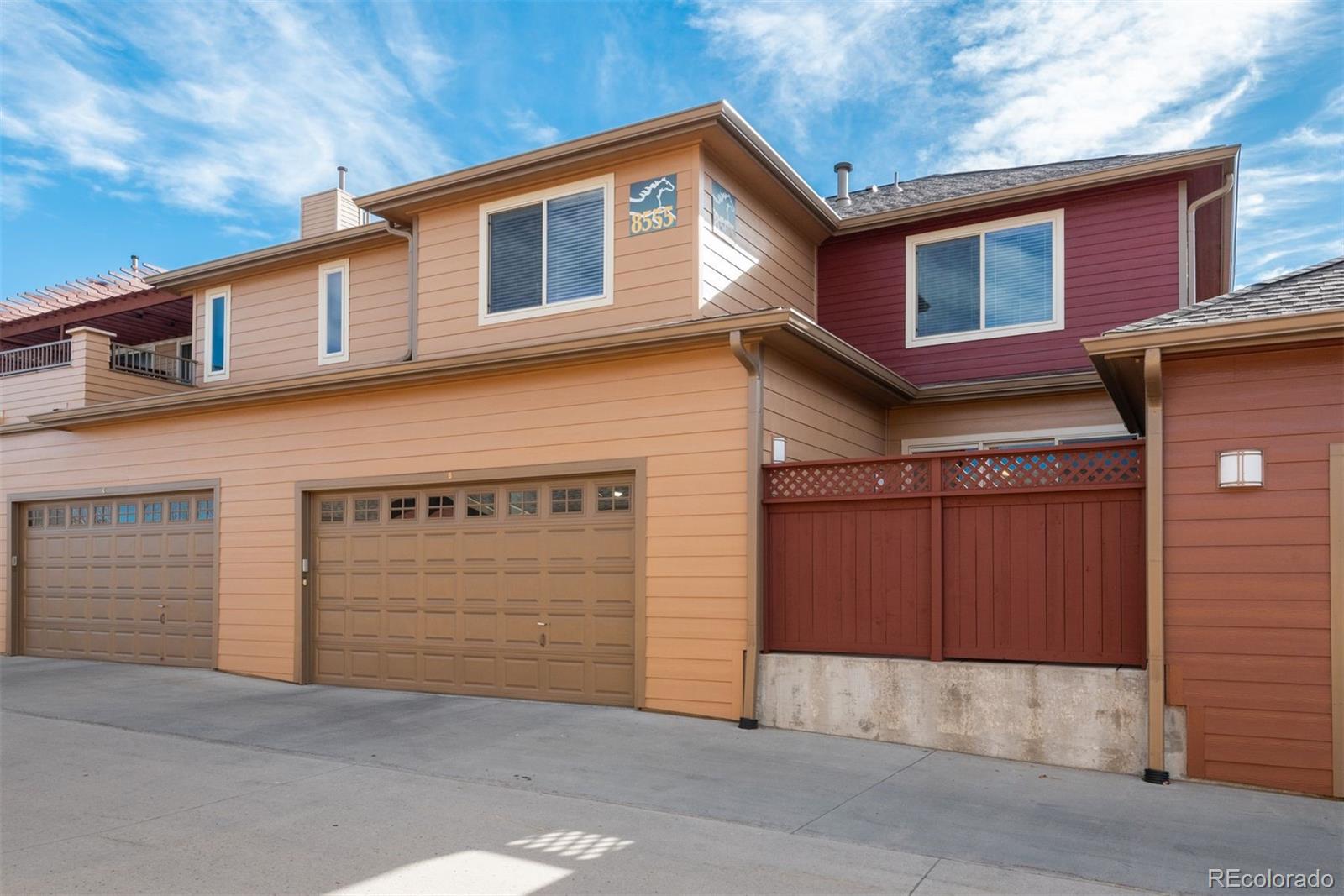 8555 Gold Peak Drive, Unit B Highlands Ranch, CO 80130 - Photo 28 of 38 a view of a house with garage