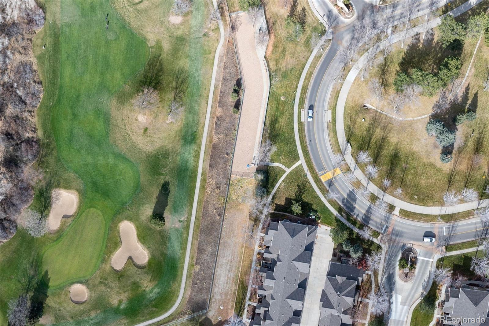 8555 Gold Peak Drive, Unit B Highlands Ranch, CO 80130 - Photo 34 of 38 an aerial view of a highlighted house