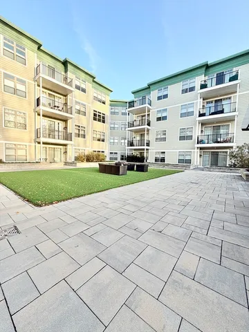 a view of building with yard