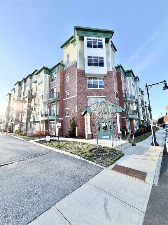 69 Foundry Street, Unit 416 Wakefield, MA 01880 - Photo 21 of 21 a front view of a building with street