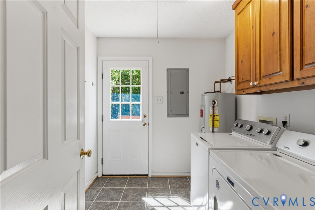 12654 Mt Olive Cohoke Road West Point, VA 23181 - Photo 15 of 31 a utility room with dryer and washer