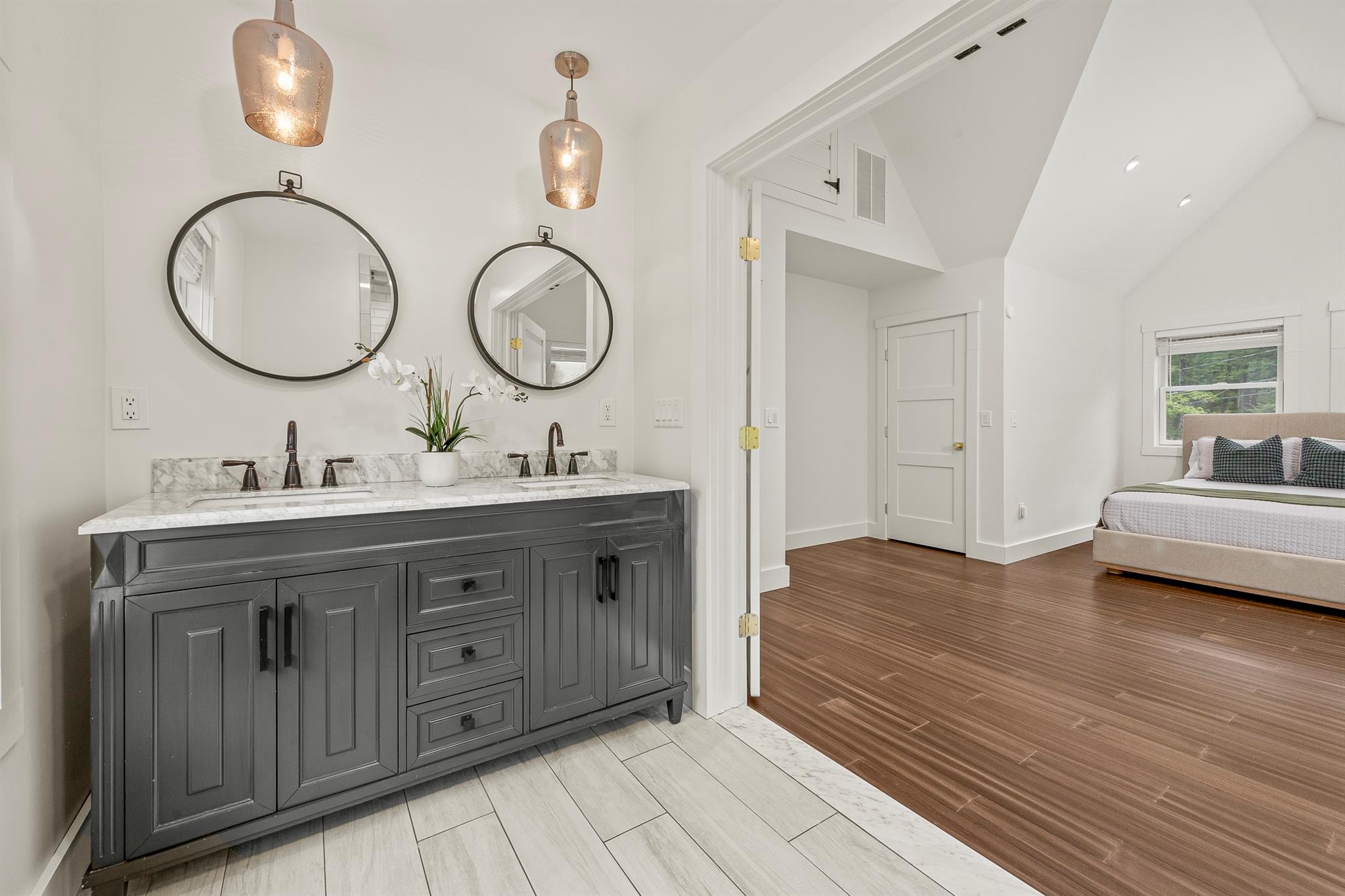 16 Anderson Road Pawling, NY 12564 - Photo 22 of 47 a bathroom with a double vanity sink and a mirror