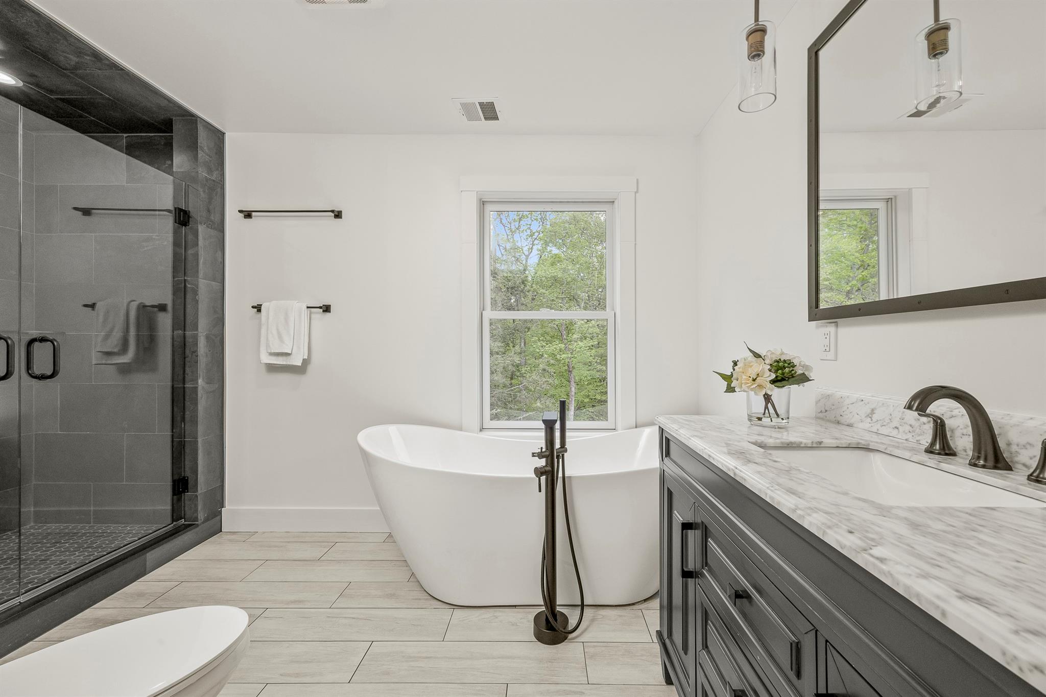 16 Anderson Road Pawling, NY 12564 - Photo 25 of 47 a bathroom with a granite countertop sink and a mirror