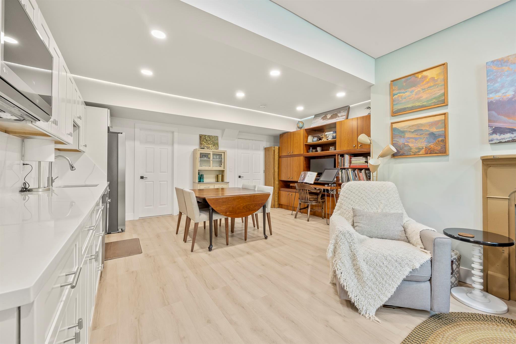 16 Anderson Road Pawling, NY 12564 - Photo 32 of 47 a living room with furniture and a dining table with wooden floor