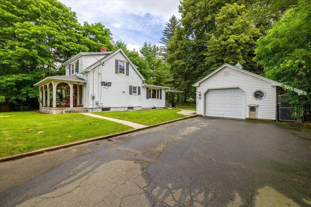 23 Fay Street Chicopee, MA 01020 - Photo 2 of 32 a house view with a garden space